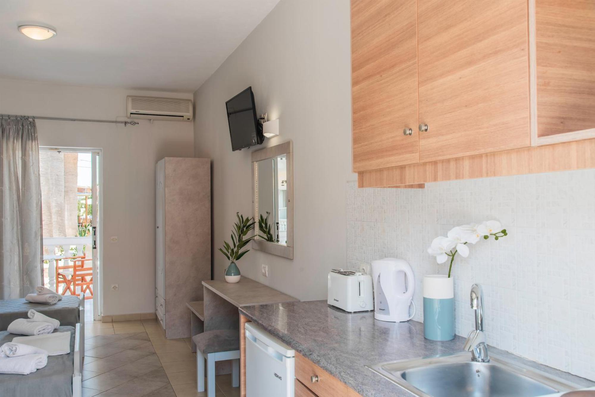 Roula Studios Pigadhakia Bagian luar foto